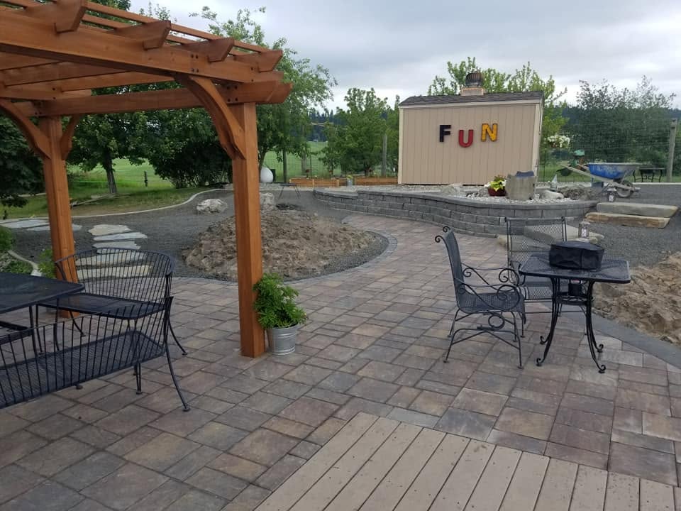 Paver patio and fire pit by Elite Hardscapes — Spokane, WA