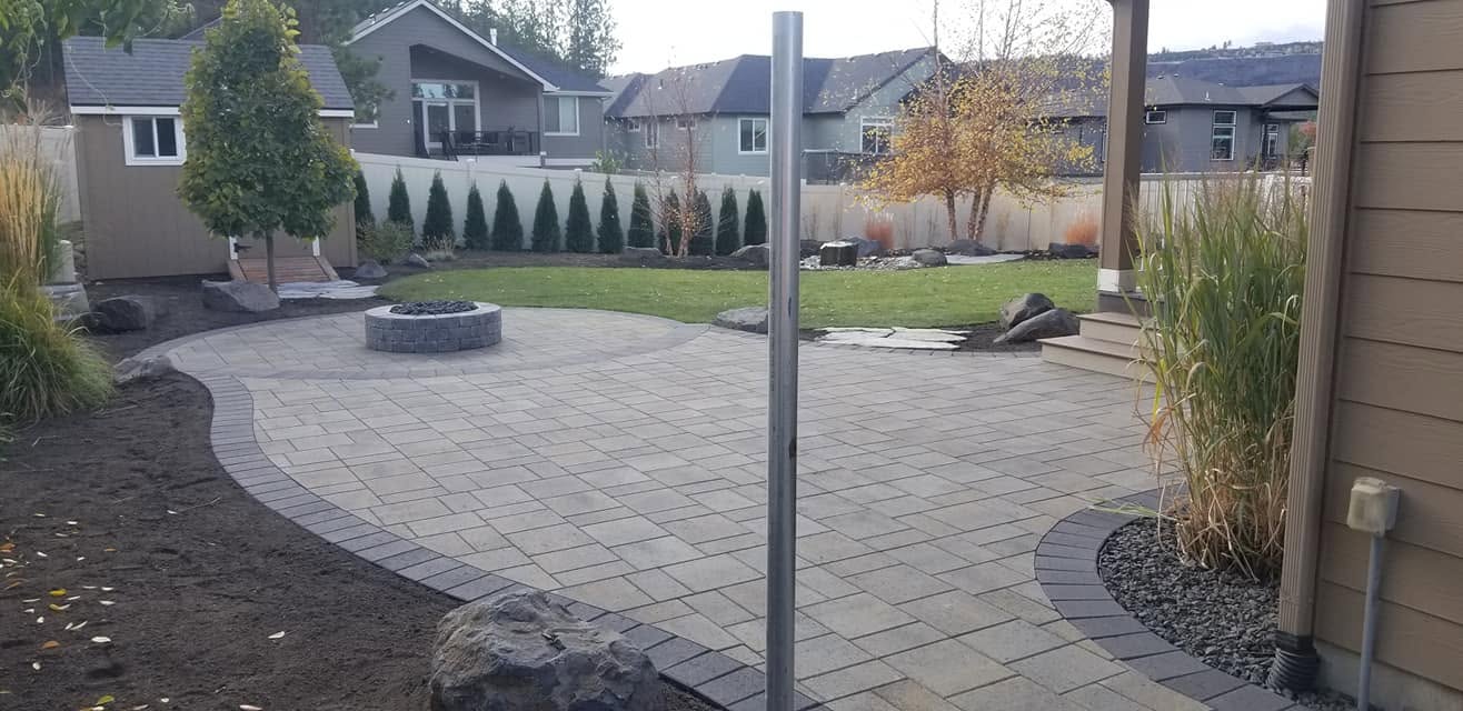 Paver patio and fire pit by Elite Hardscapes — Spokane, WA