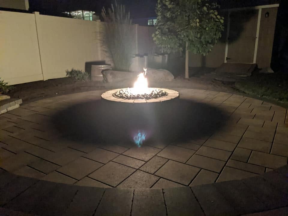 Paver patio and fire pit by Elite Hardscapes — Spokane, WA