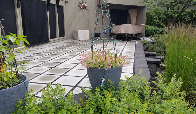 Stone walkway and retaining wall installed by Elite Hardscapes in Spokane, Washington